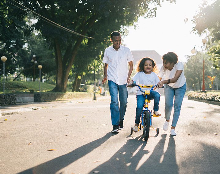 Family Lawyers in Franklin, TN | Aggressive Divorce and Family Attorneys - Image of family outdoors spending time together.